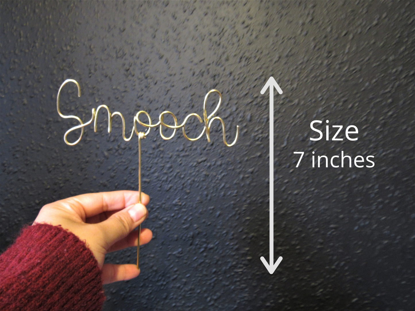 Smooch wedding cake topper