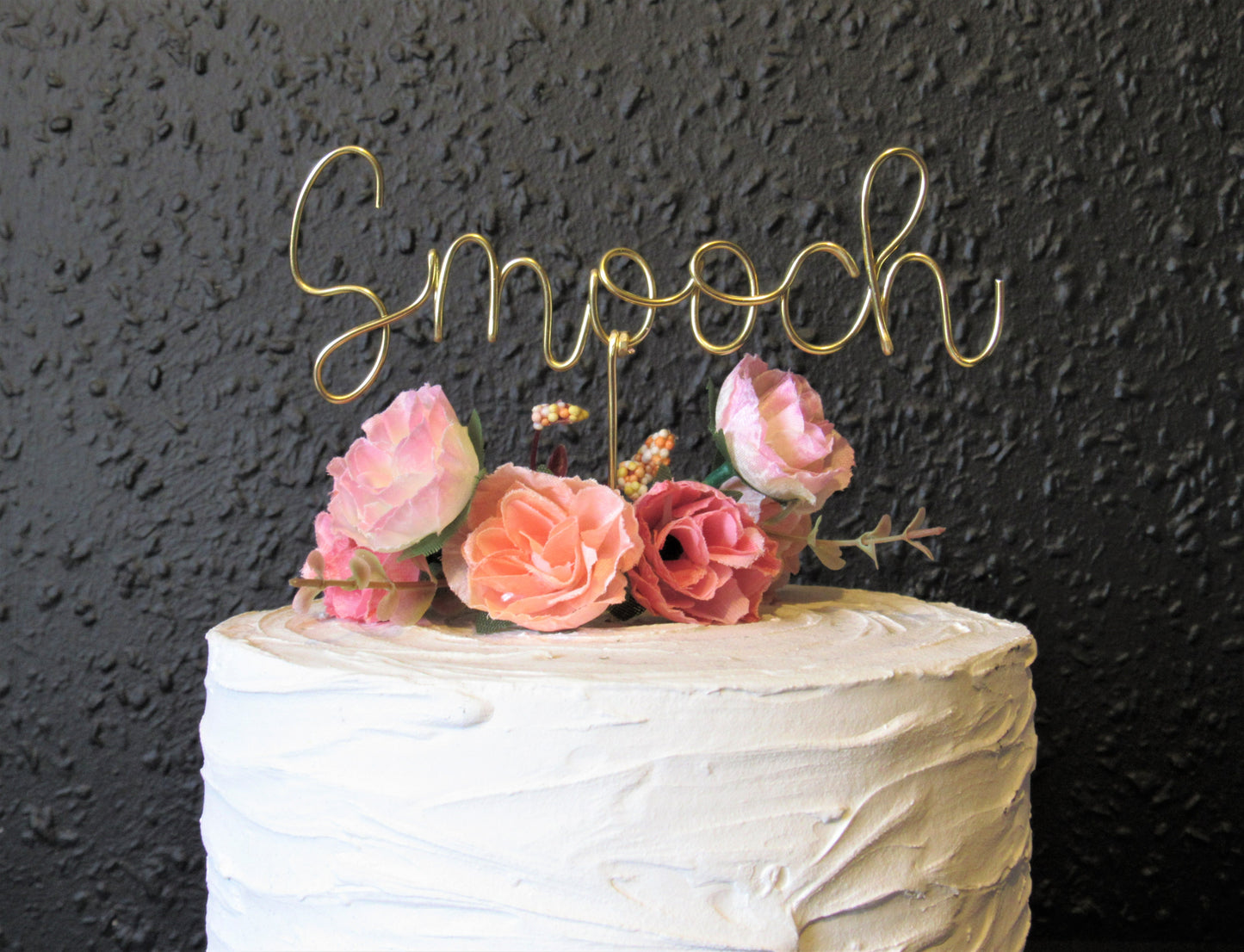 Smooch wedding cake topper
