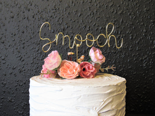 Smooch wedding cake topper