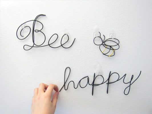 Bee Happy wire words wall art with a bee
